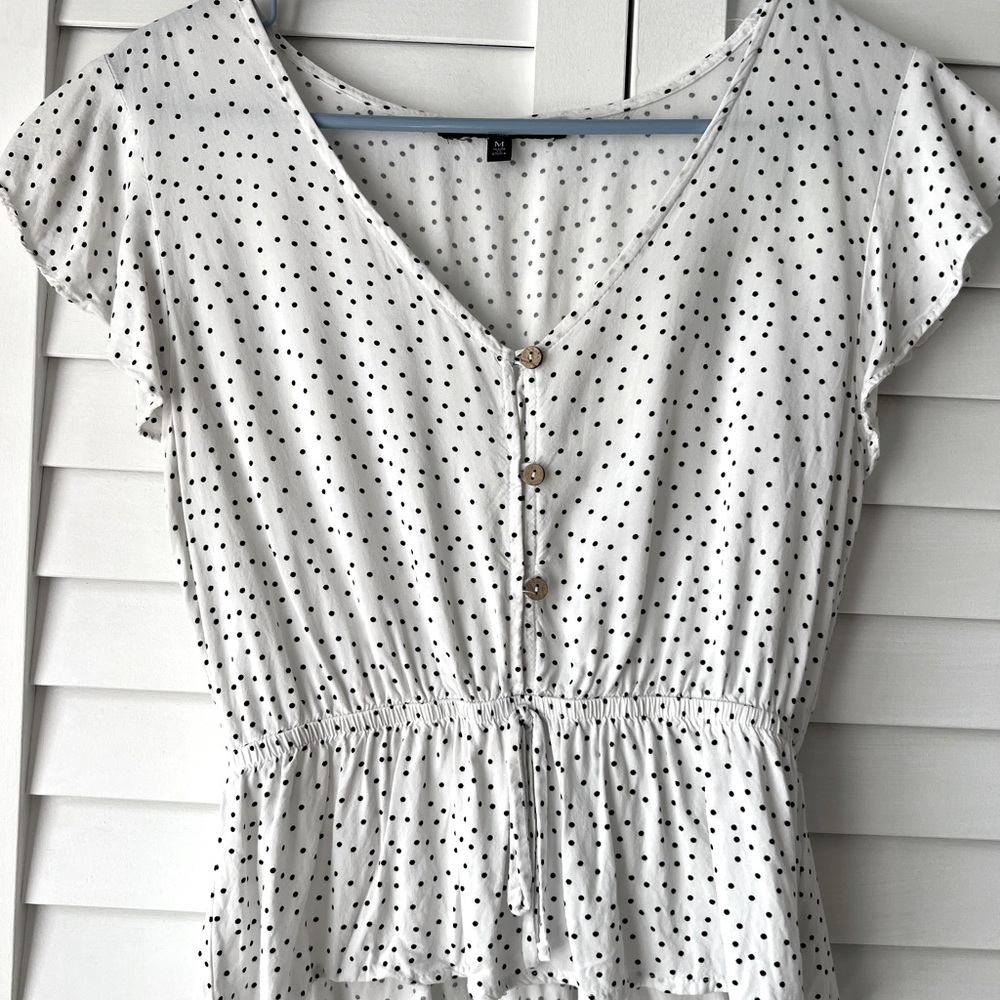 Cute white blouse with black dots.